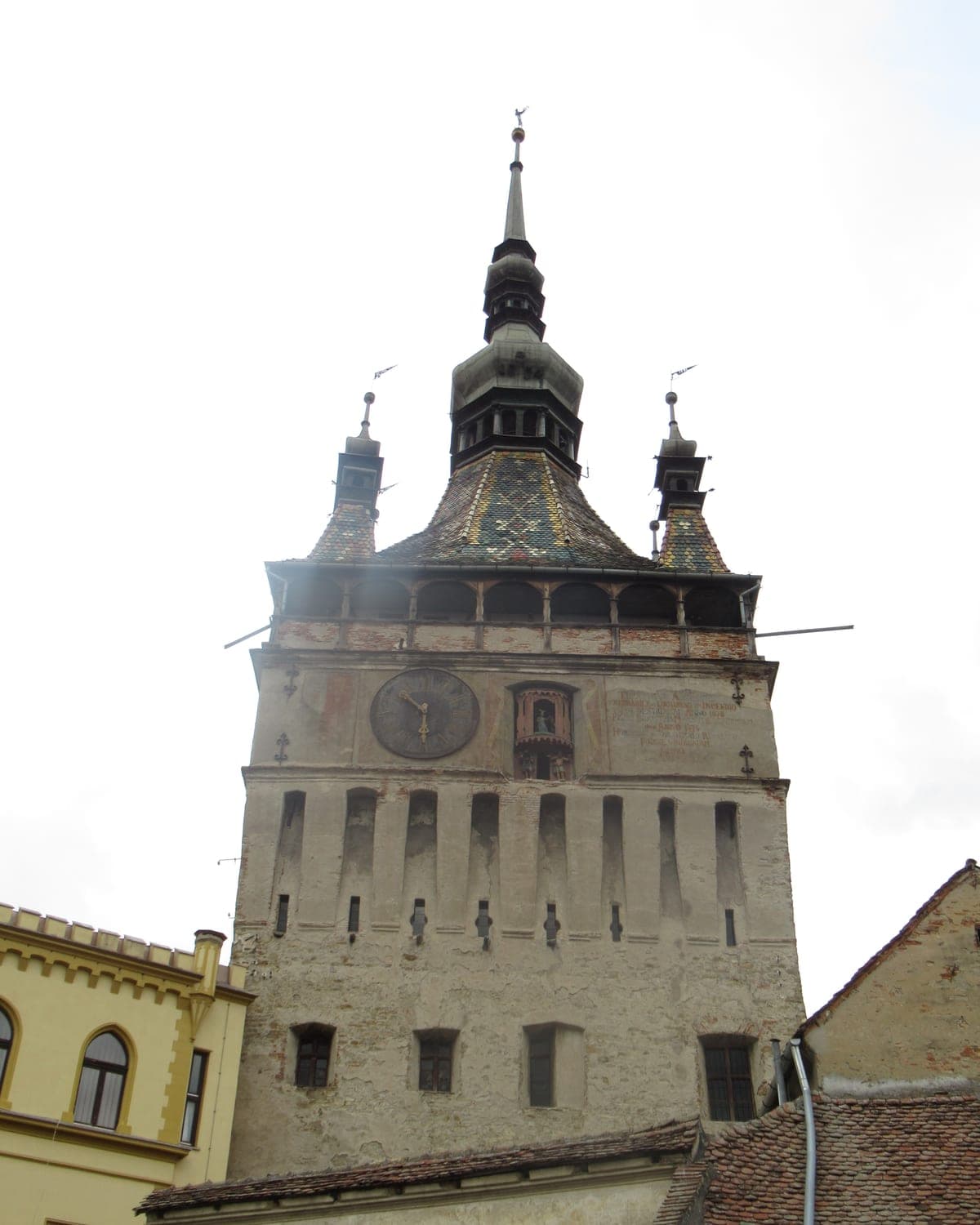Sighișoara Clock Tower with its colourful glazed tile roof and painted clock face